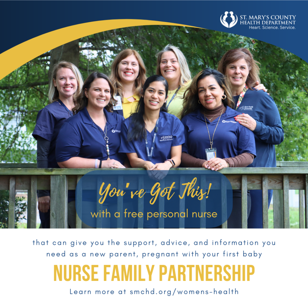 A photograph of the specialty trained nurses at SMCHD that are part of the NFP program posed behind of a wooden railing outside, in front of trees. The bottom has a white footer with blue font.