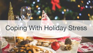 dinner table in front of a Christmas tree